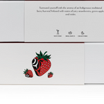 White packaging box with strawberry design and text on a white background
